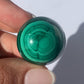 Sfera in malachite / Protezione e trasformazione