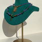 Collana in tanzanite e smeraldo dello Zambia con chiusura regolabile di acciaio inossidabile / Autorealizzazione ed emancipazione